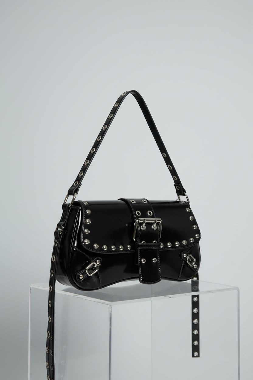 Detailed view of black and silver purse by Verdusa showcasing craftsmanship and materials.