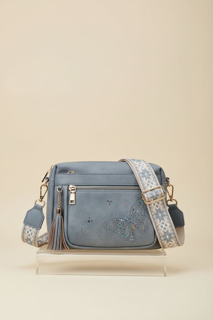 KITEVIUN butterfly design crossbody bag displayed in a clean studio setting