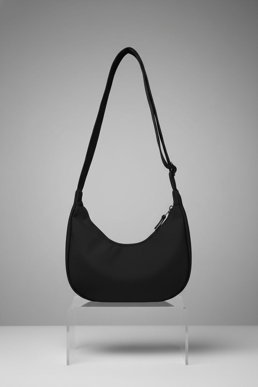 Iioscre crescent crossbody sling bag showcasing craftsmanship with adjustable strap and zippers.