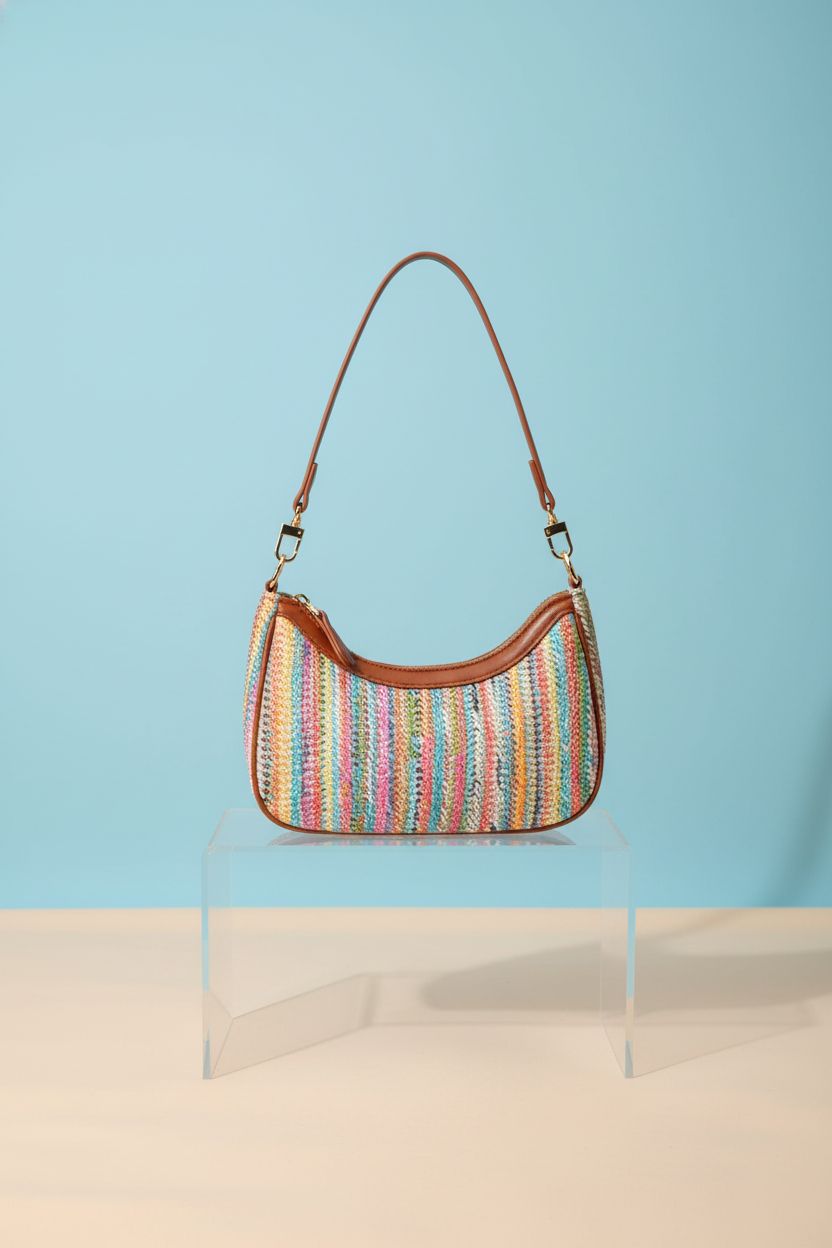 KKXIU colorful shoulder bag showcased on a minimalist studio set.
