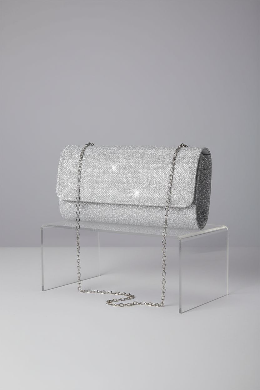 lovyoCoCo silver glitter clutch showcased on acrylic riser, highlighting its design