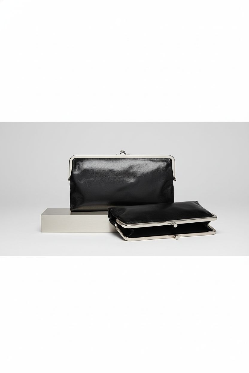 HOBO Lauren Leather Clutch Wallet on dove-gray backdrop, showcasing sleek design and hardware