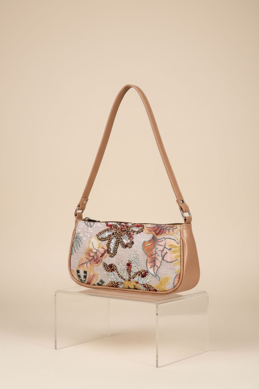 Product shot of Verdusa floral beaded bag, highlighting its detailed craftsmanship and sleek design.