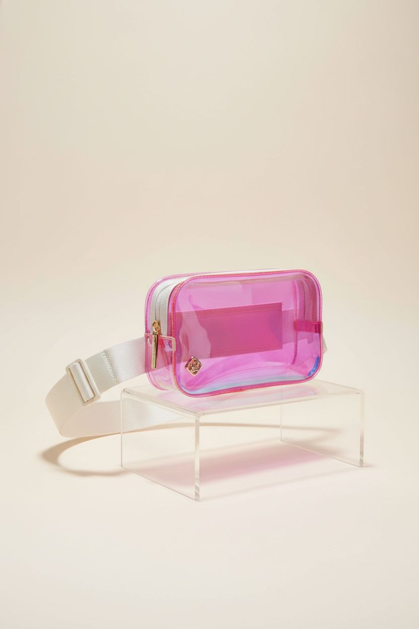 Kendra Scott iridescent pink clear belt bag showcased on a studio backdrop