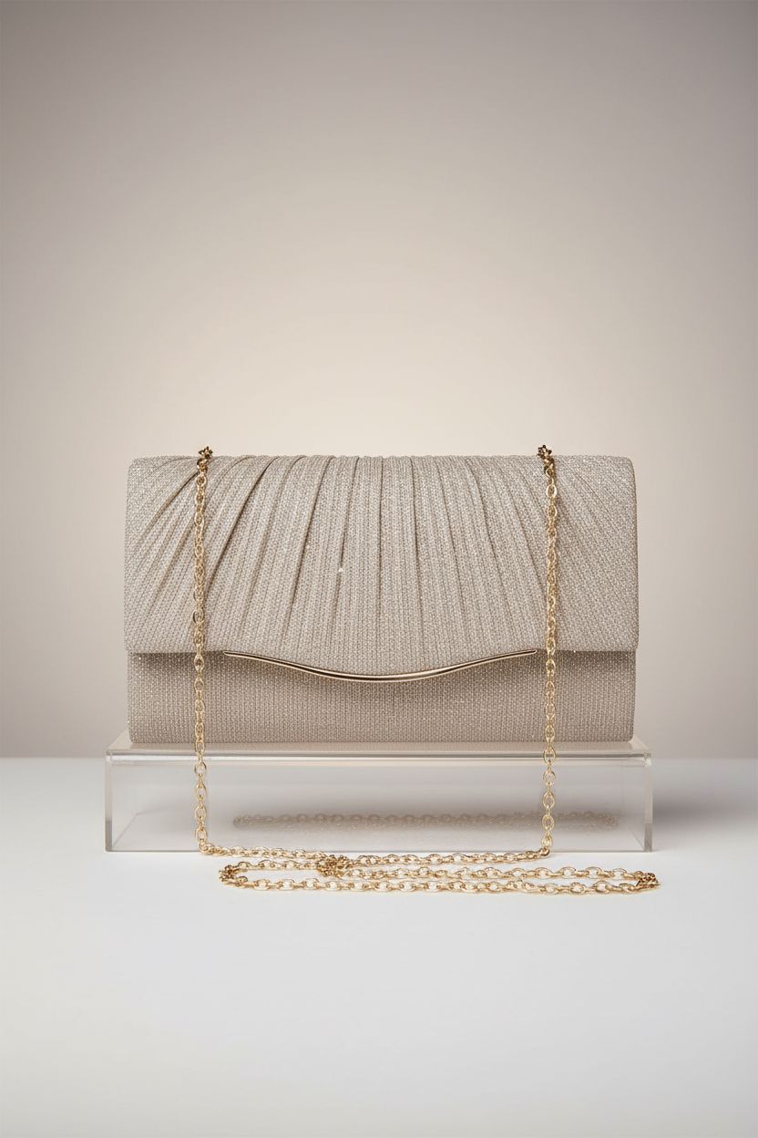 Detail of lovyoCoCo champagne clutch purse showcasing sequined texture and sleek design