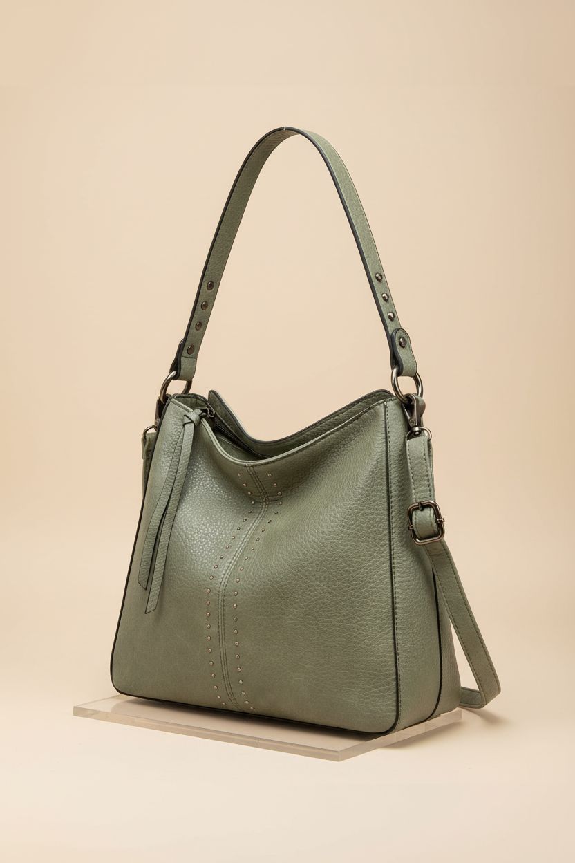Montana West sage hobo bag featured in studio with focus on its structure and quality.