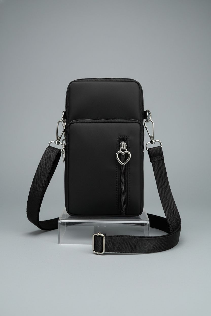 JANKS mini crossbody bag showcased on an acrylic riser, highlighting quality design.