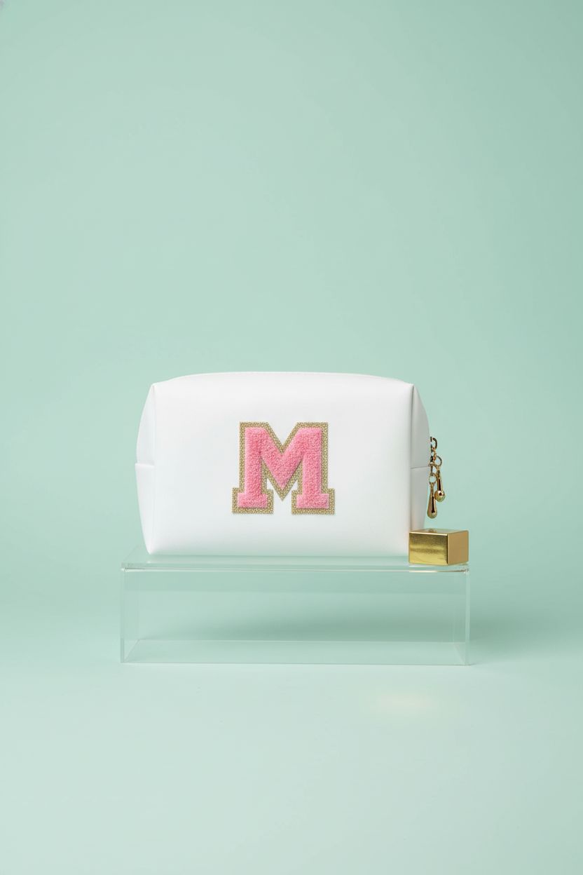 ChaoGreat white personalized makeup bag with gold zipper displayed in a clean studio setting, highlighting design details.