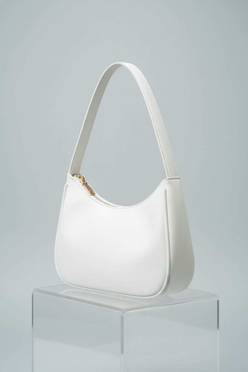 Close-up of CYHTWSDJ white leather hobo bag, highlighting premium materials and craftsmanship.