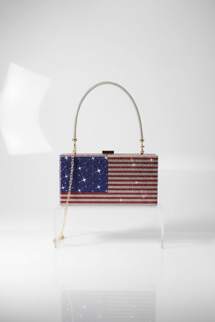 Pearl&she American flag purse showcased on a sleek display, highlighting luxurious crystal details.