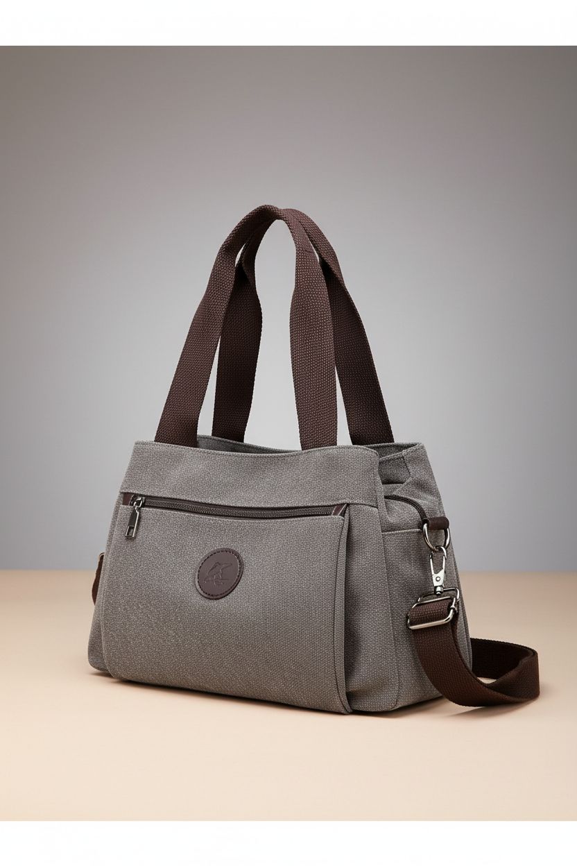 DOURR gray canvas medium satchel showcasing its design and features