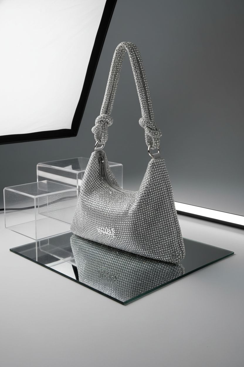 Product shot of lovyoCoCo's silver rhinestone purse showcasing its elegant design.