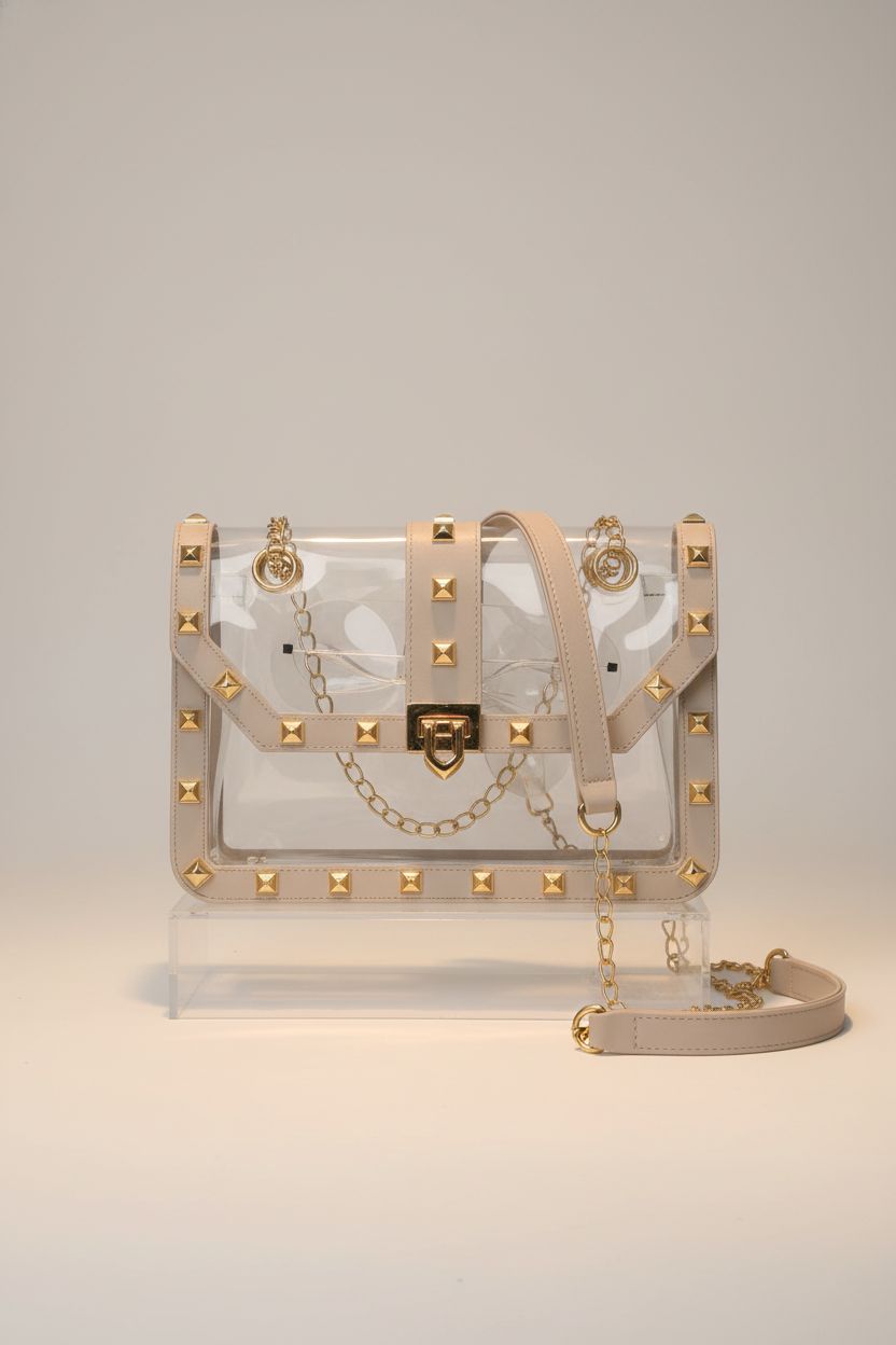 Close-up of Missnine clear bag highlighting craftsmanship, gold studs, and adjustable strap.