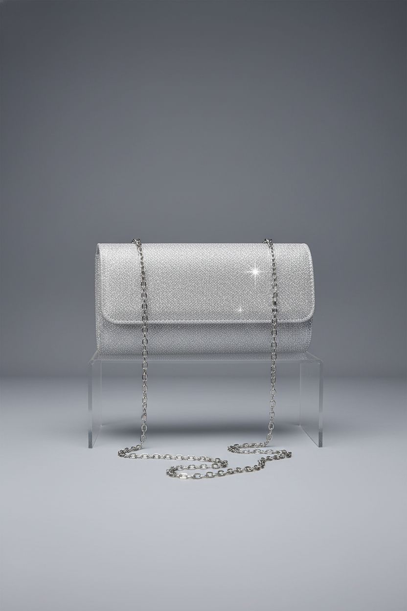 Detailed view of lovyoCoCo evening bag clutch showcasing glitter fabric and chain design.