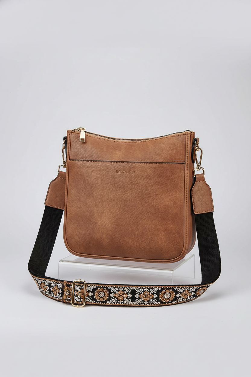 BOSTANTEN crossbody bag in brown, featuring sleek design and gold-tone hardware, perfect for any occasion