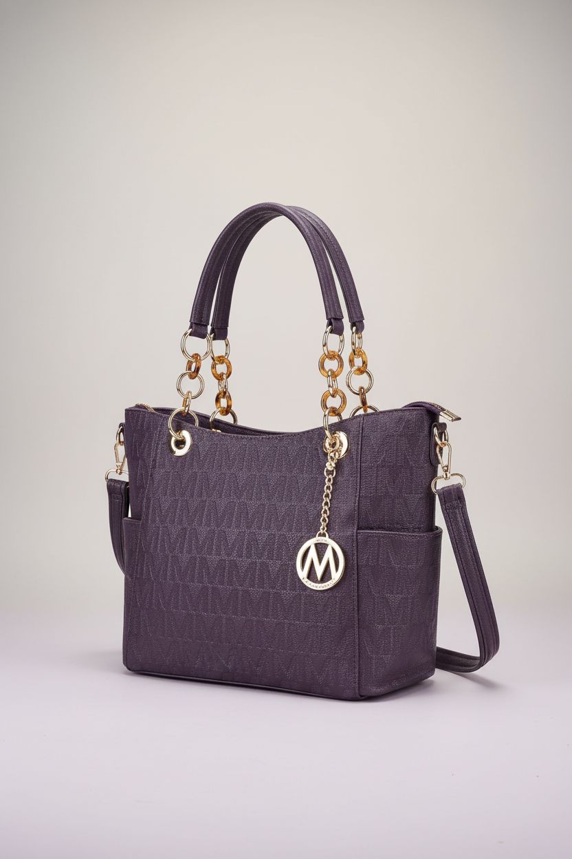 MKF Collection purple handbag in a studio setting highlighting its vegan PU material and elegant design.