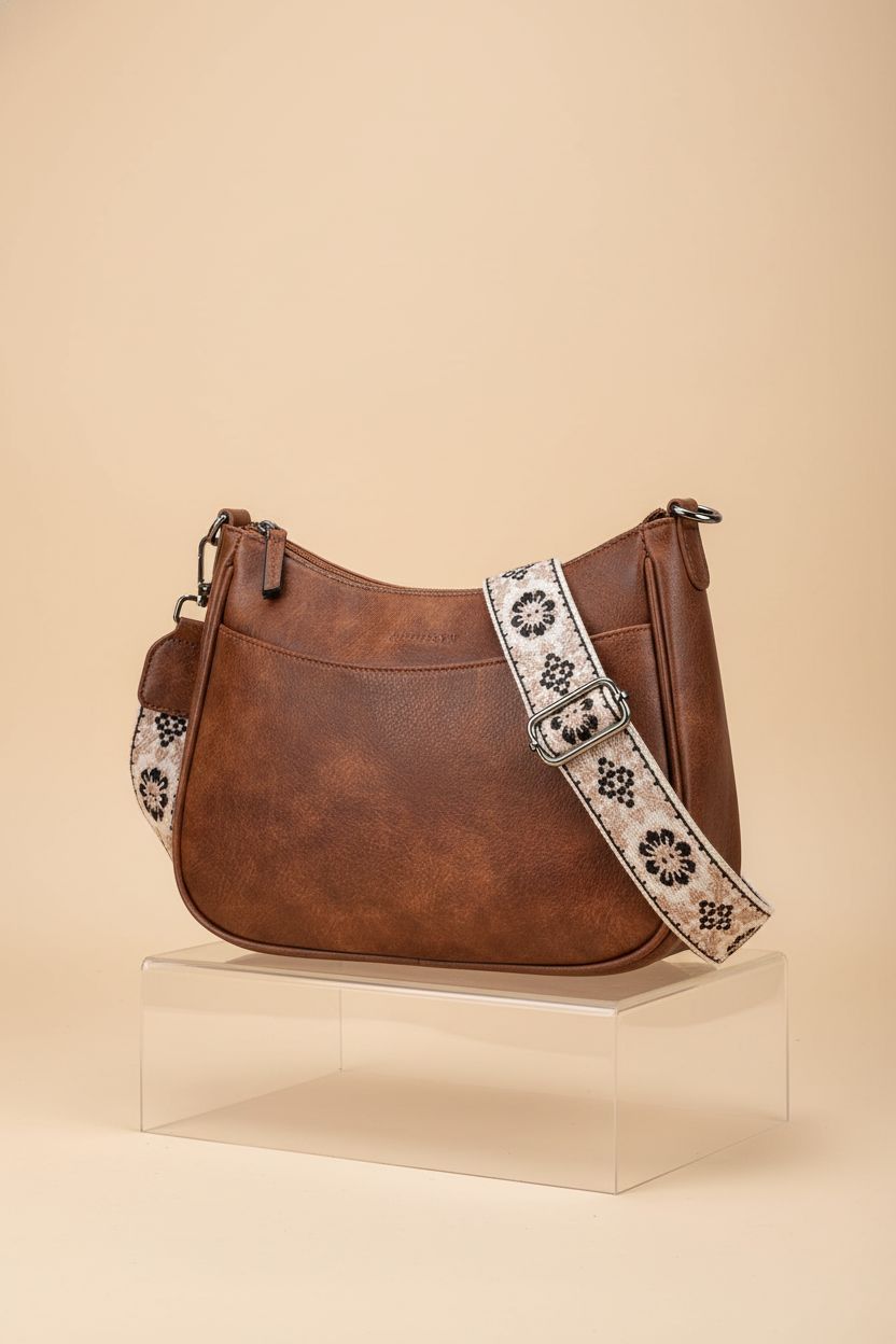 Elegant APHISON leather crossbody purse showcased in a clean studio setting.
