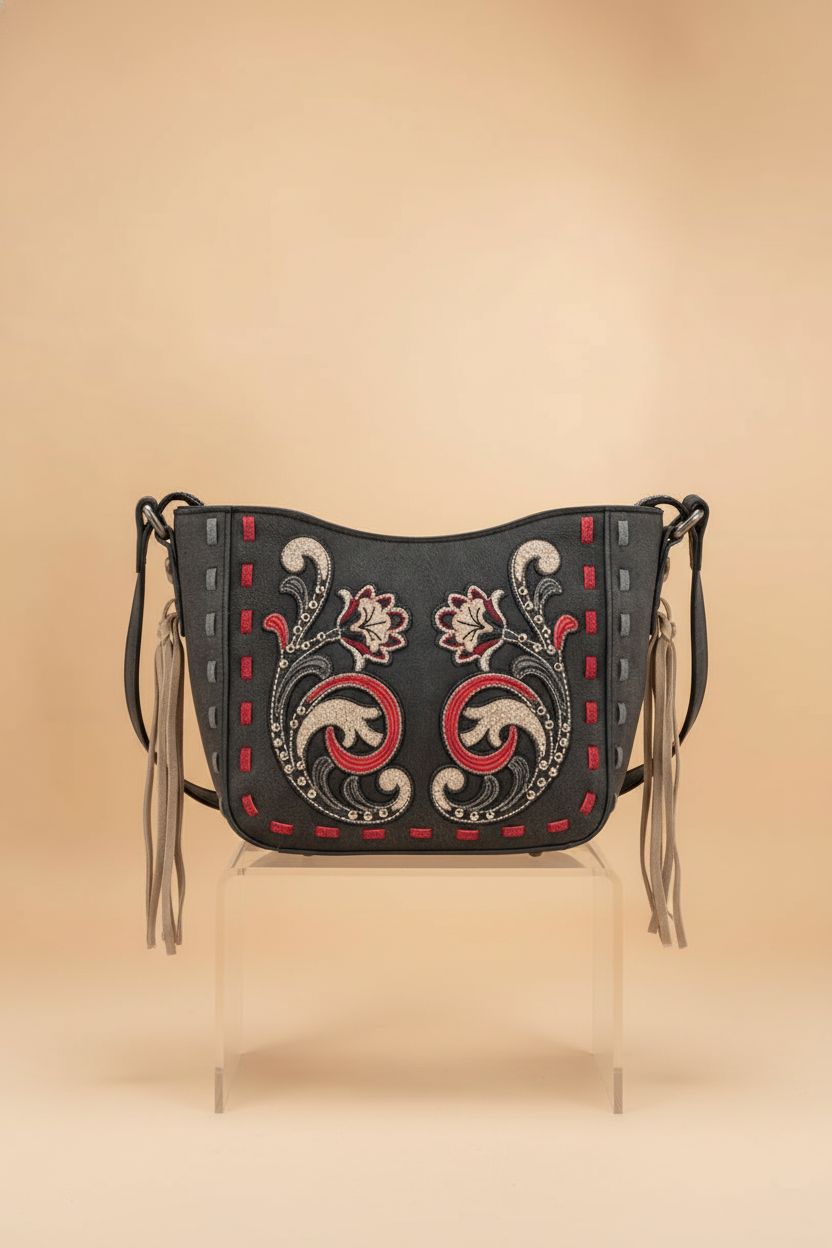 Montana West vintage floral handbag displayed on an acrylic riser, showcasing detailed embroidery