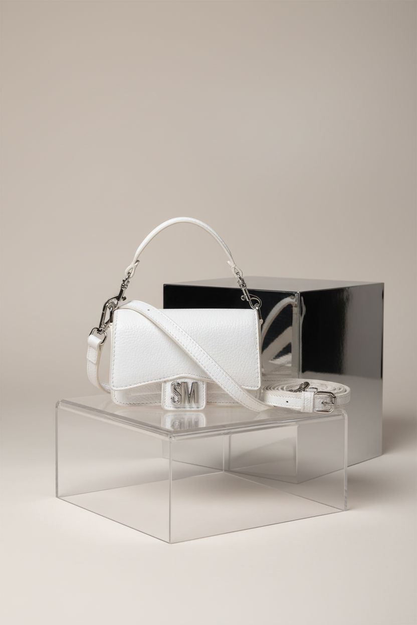 Product image of Steve Madden white crossbody purse on a clean studio set
