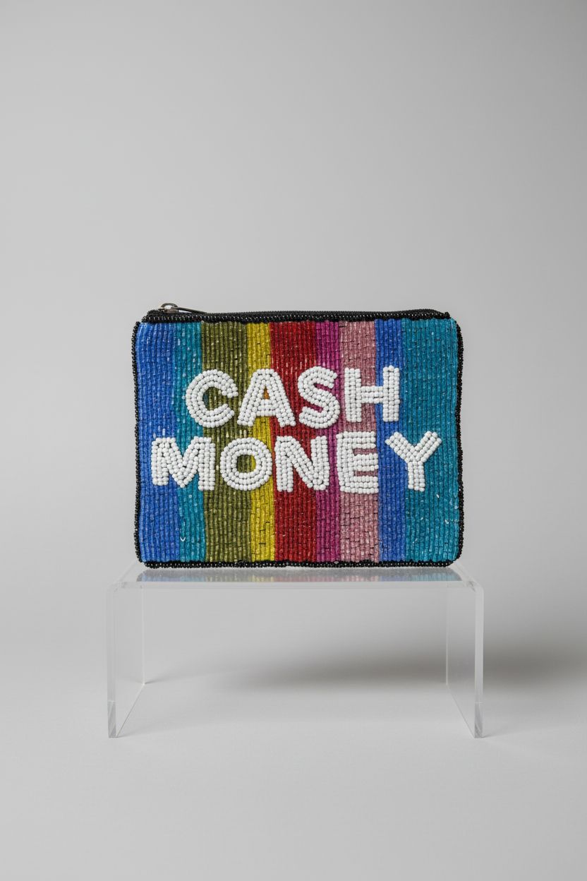 TWINE AND LOVE beaded coin purse displayed on a gray backdrop, highlighting its craftsmanship.