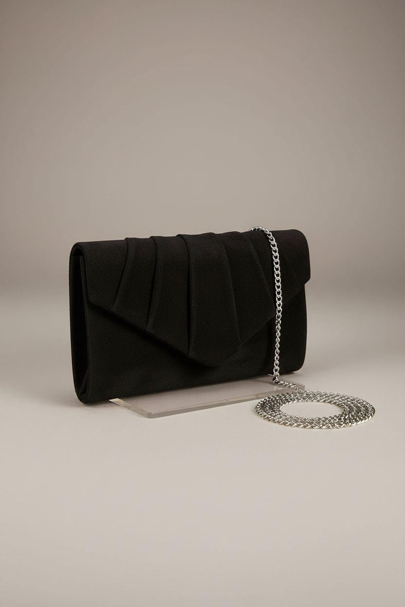 Product shot of BBjinronjy black suede clutch purse on an acrylic riser