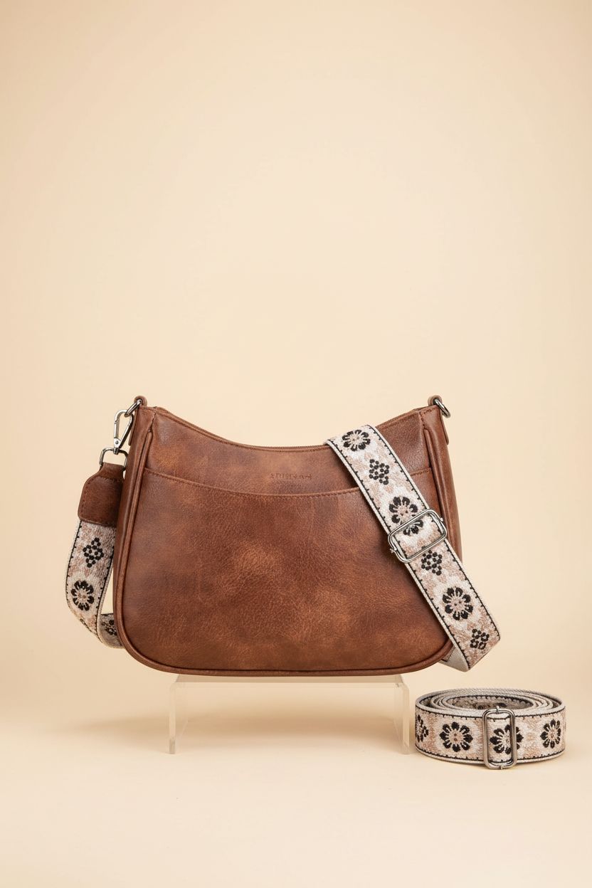 Close-up of APHISON crossbody purse highlighting its adjustable strap and leather detail