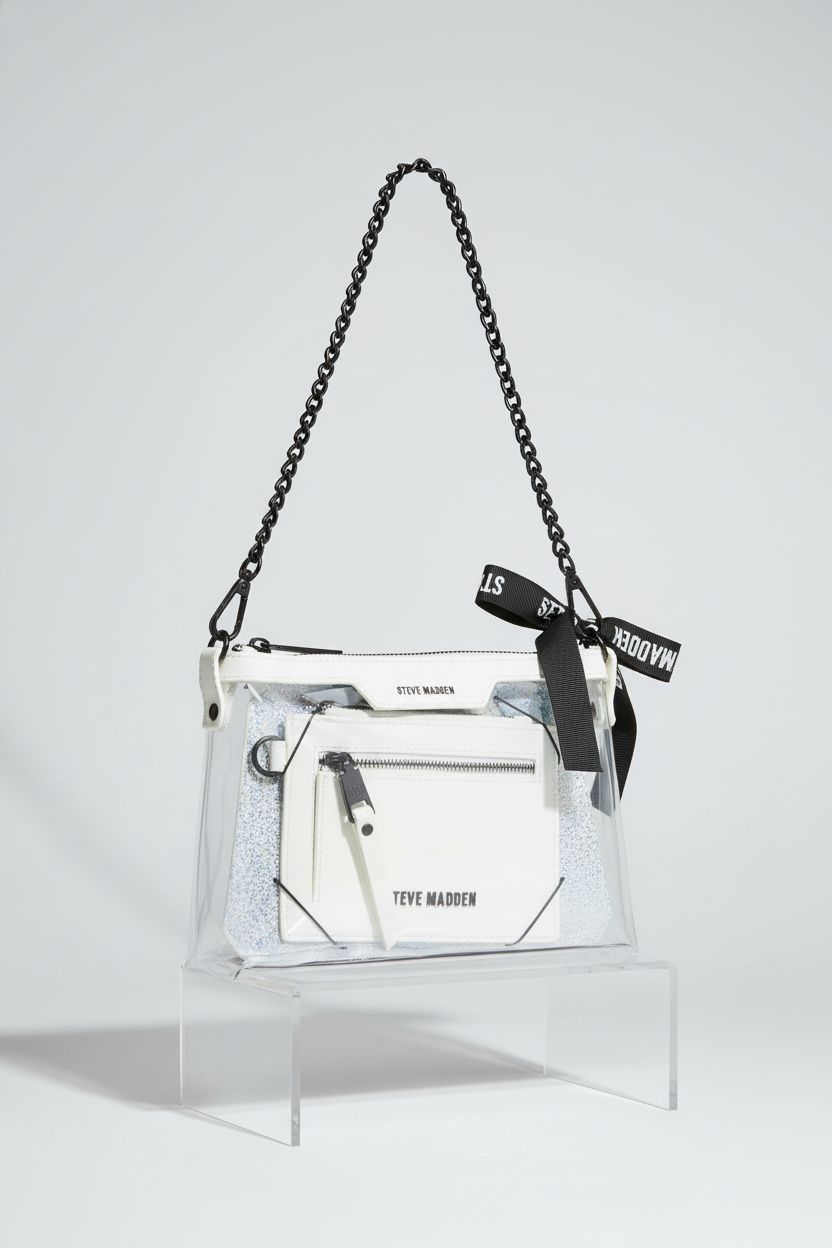 Product-focused shot of Steve Madden Clear Bag on gray backdrop, showcasing craftsmanship and sleek design.
