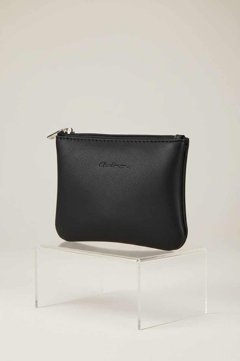 Close-up of Chelmon vegan leather coin purse showcasing its sleek design and zipper.