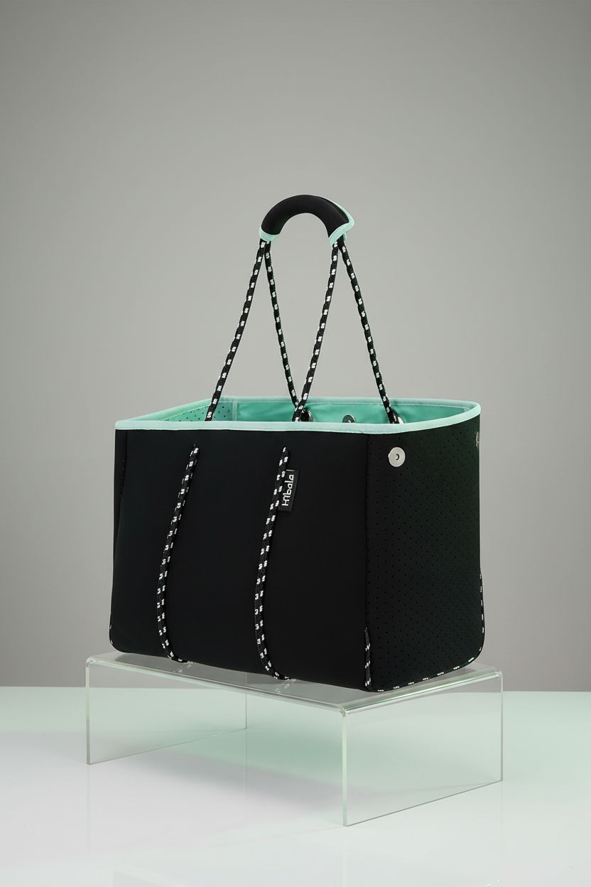 Hibala neoprene tote bag on a studio set, highlighting its stylish design and durable material.