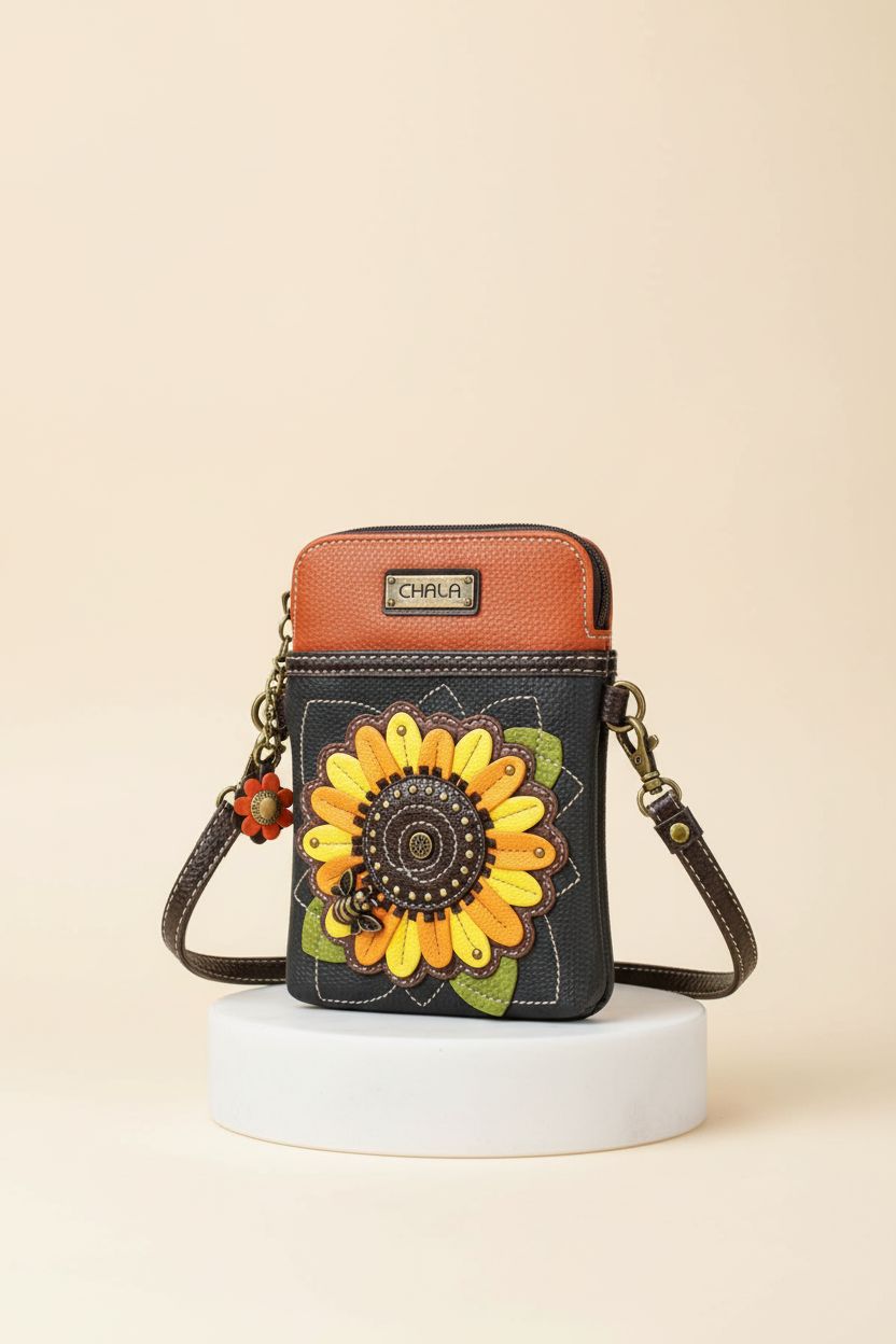 Detailed view of CHALA sunflower purse in navy, highlighting its elegant design, stitching, and sunflower applique.