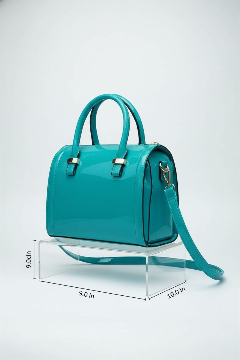Dasein turquoise faux leather mini barrel bag displayed on acrylic riser against clean backdrop
