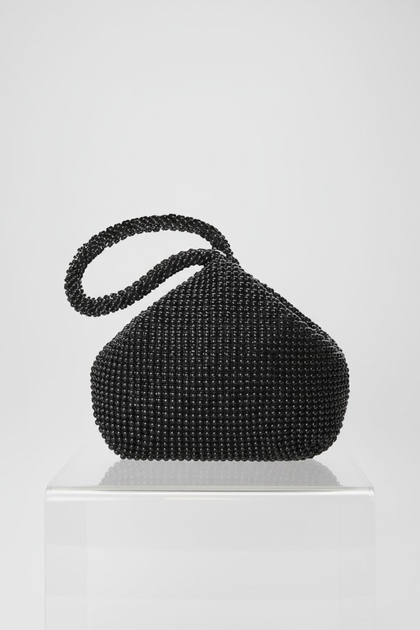 BABEYOND triangular beaded clutch in pristine detail on a gray background, perfect for 1920s style