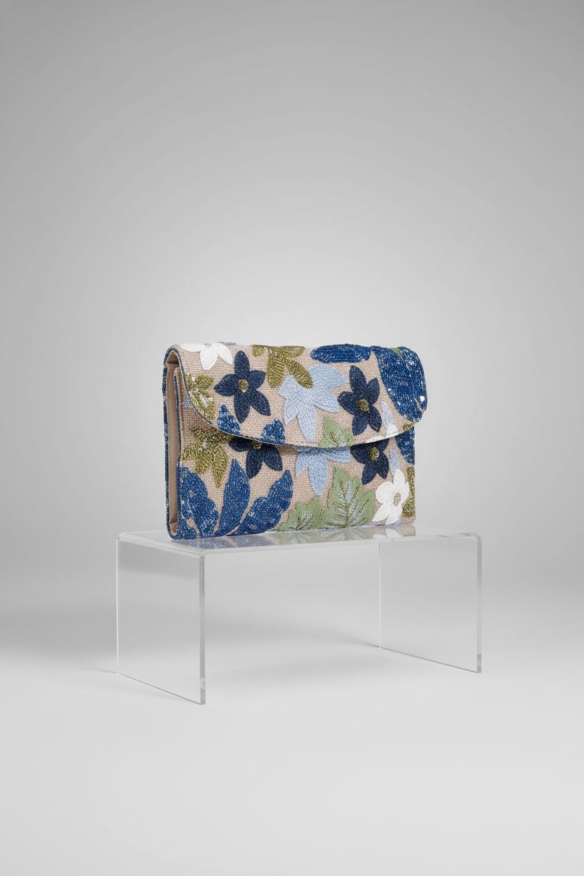 Detailed view of Verdusa floral sequin clutch showcasing fine craftsmanship