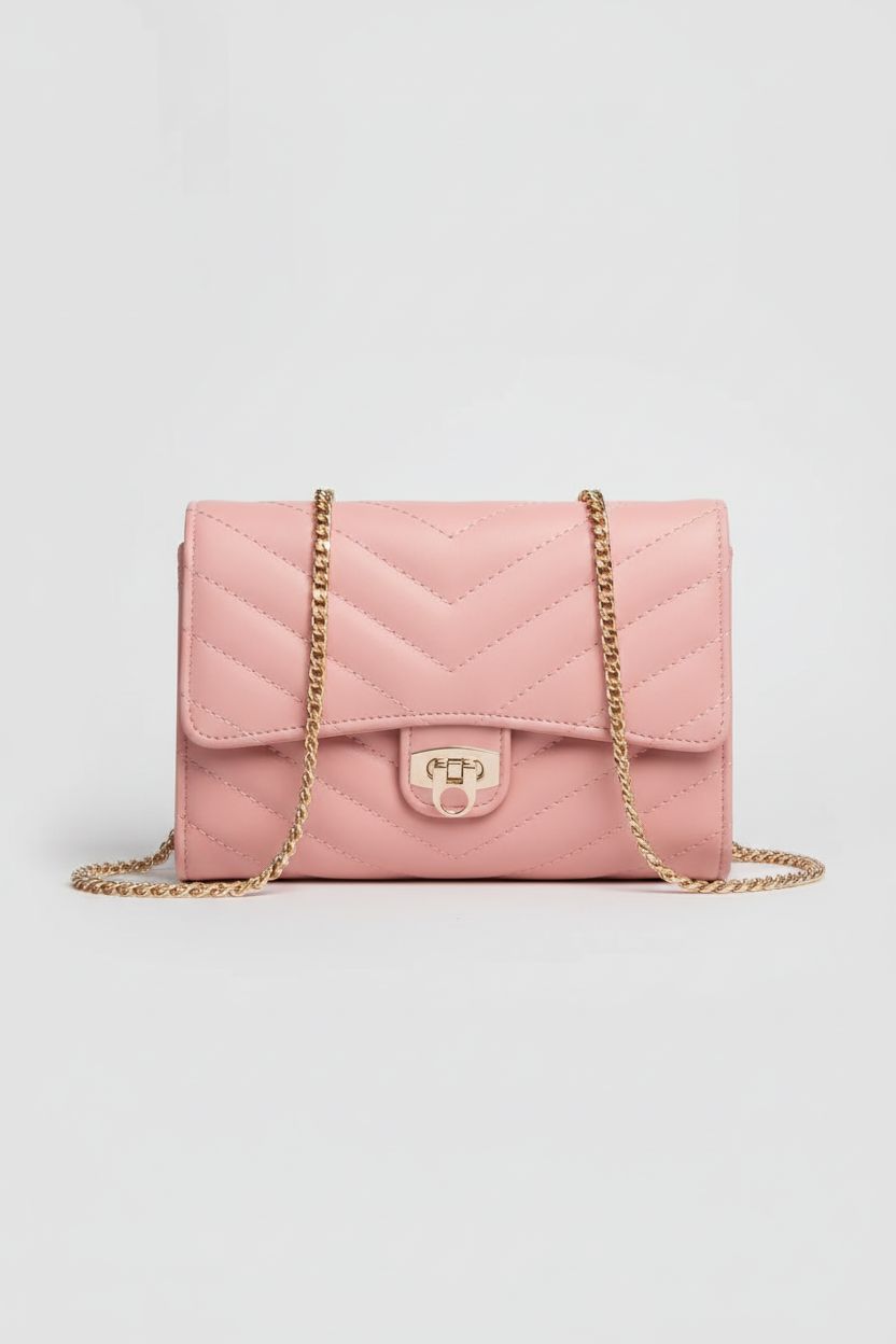 YAZEKOUS pink small crossbody bag showcasing its luxurious leather and detailed stitching.