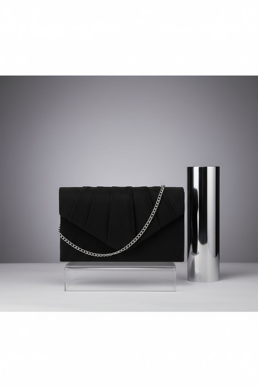 BBjinronjy black suede clutch displayed on acrylic riser showcasing its sleek design and chain.