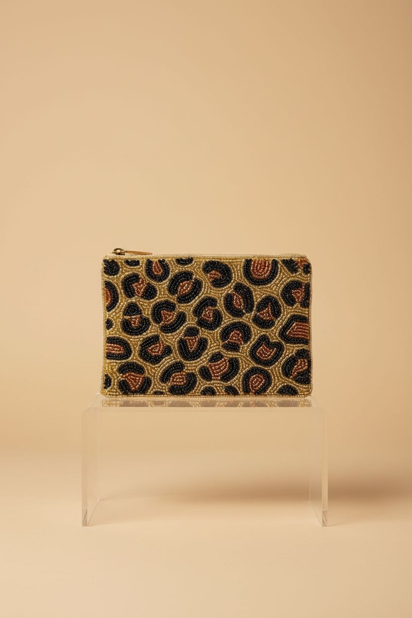 Pretty Robes beaded coin purse showcasing intricate beadwork and zipper