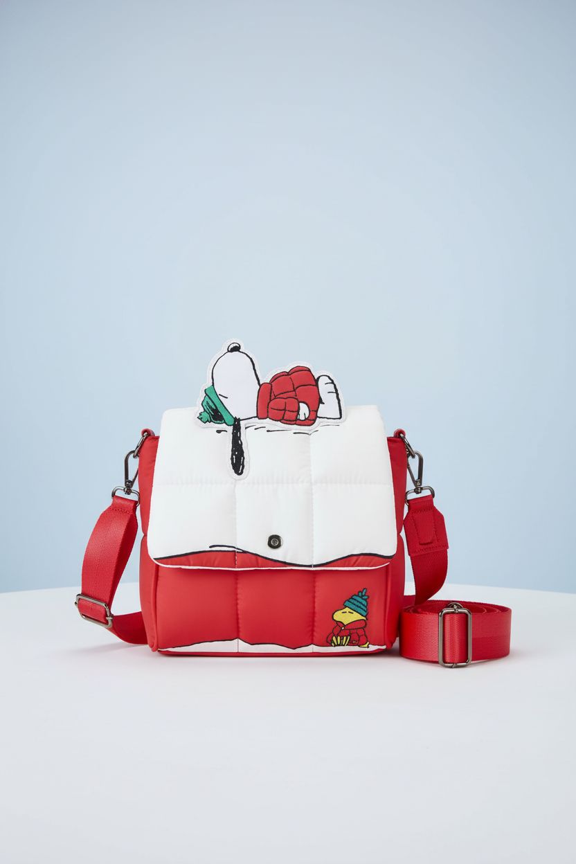 Loungefly Peanuts Holiday Collection crossbody bag featured on a clean white backdrop, highlighting its quilted design.