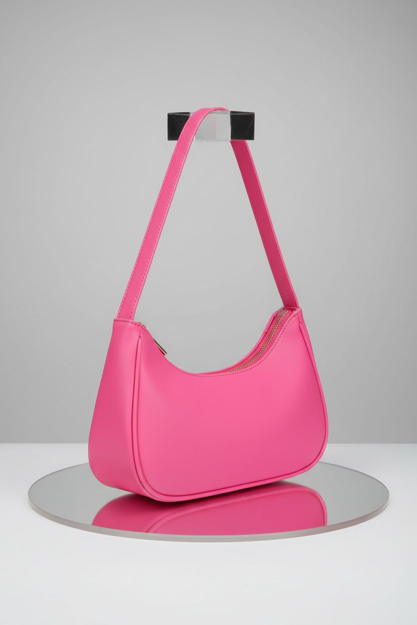 Afashor pink hobo purse on a clean studio backdrop, showcasing its sleek design and vegan leather details.