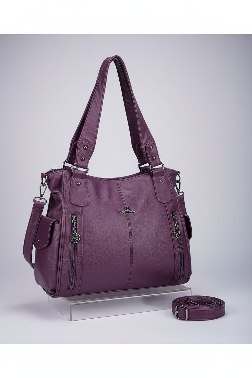 Stylish Angel Kiss purple hobo handbag showcased on a riser, highlighting its design and pockets.