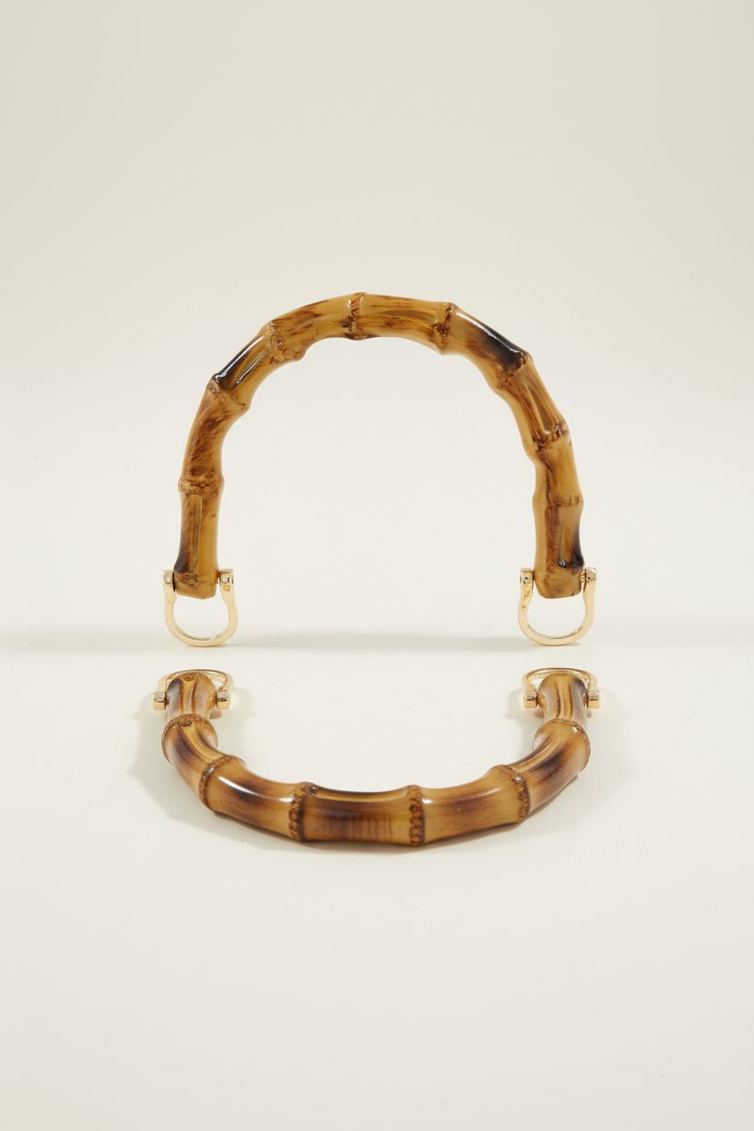 Piutouyar bamboo-style handbag handles showcased in a clean studio for bag-making projects.
