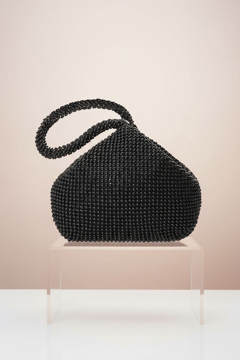 Stylish BABEYOND beaded clutch showcased on a clean studio backdrop