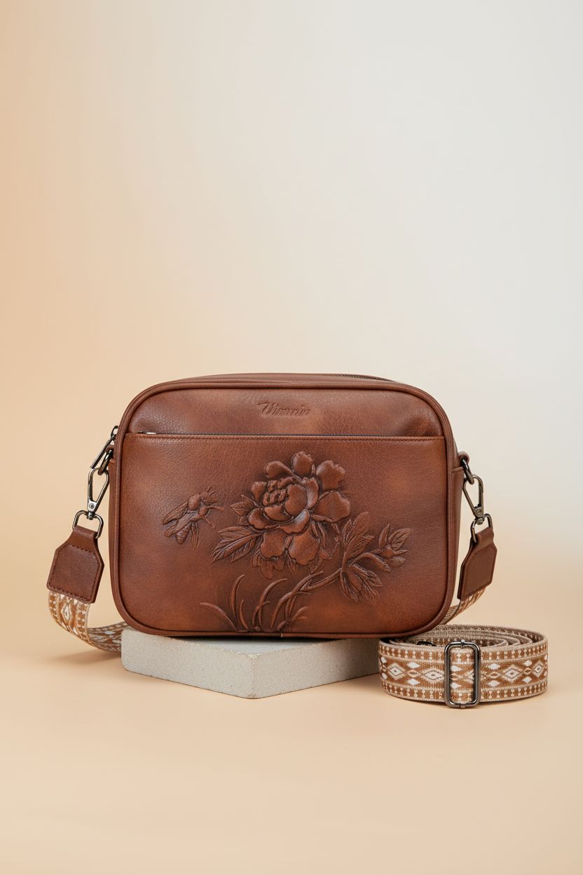 VIMUTI small brown crossbody bag showcasing exquisite craftsmanship in studio lighting