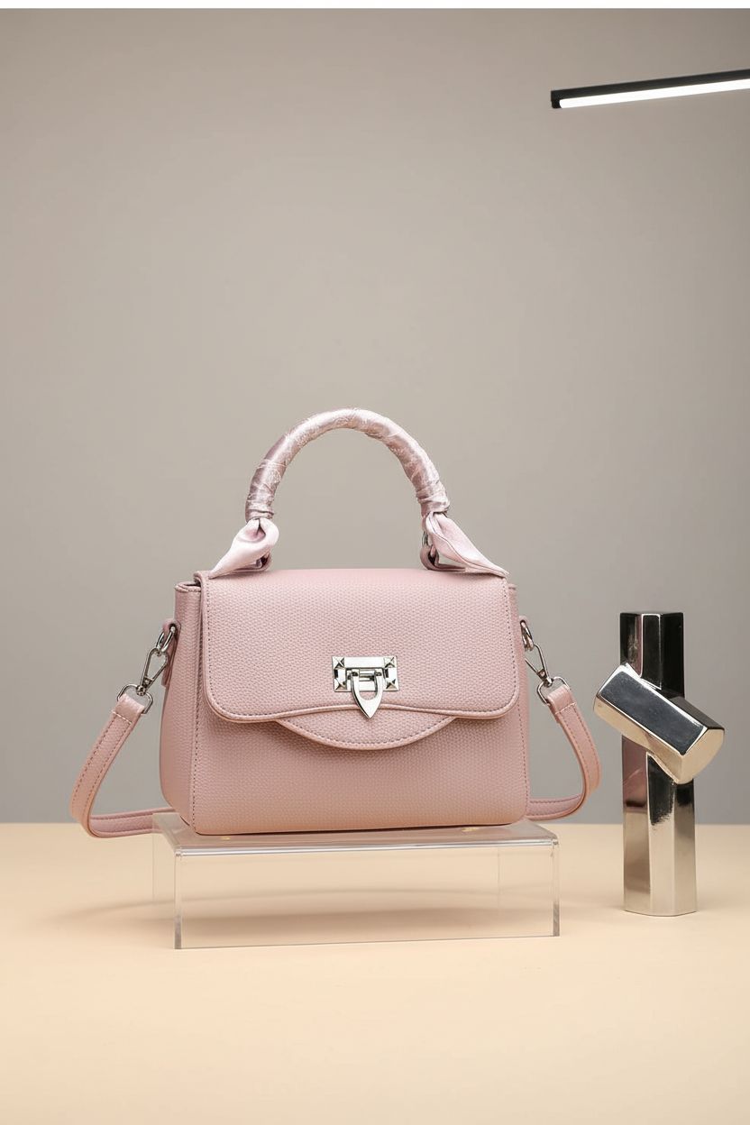 Tigpoy large pink hobo handbag on a minimalist studio backdrop, showcasing its design and features.