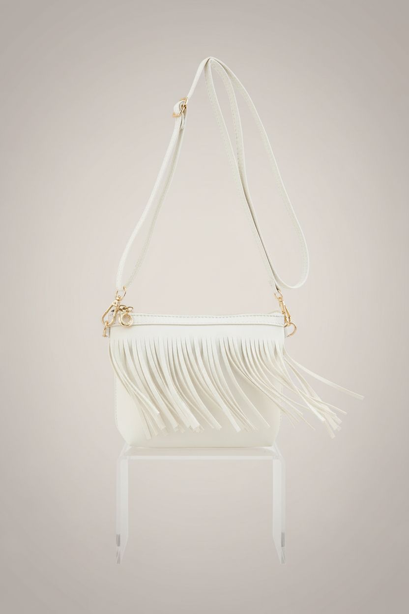 FashionPuzzle off-white fringe crossbody bag highlighting texture and design features