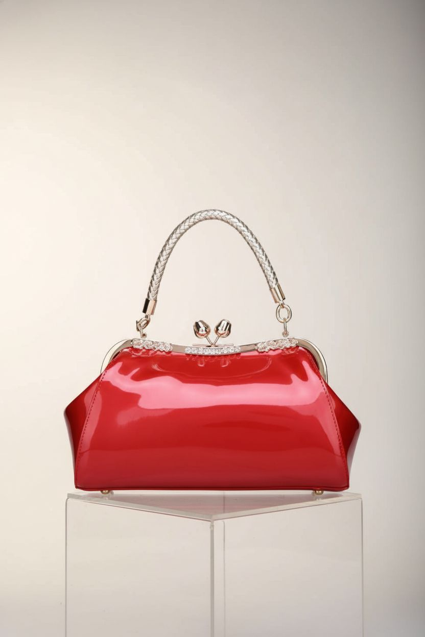 ZiMing glossy red patent leather kiss-lock tote bag on cream background